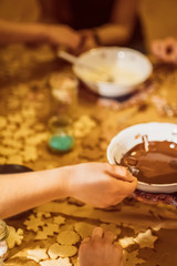 Group of young people baking cookies for christmas