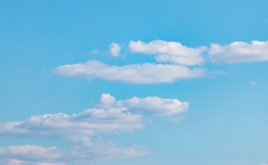 white clouds in the blue sky