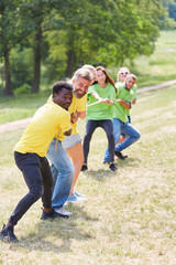 Fototapeta premium Teams measure forces in tug-of-war