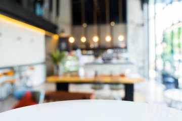 A white table with a blurry background.
