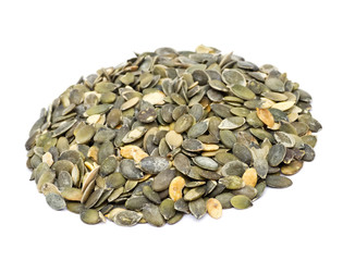 Pumpkin seeds pile isolated on white background