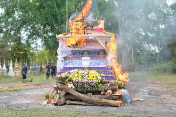 Cremate death in Thailand, Funeral of the villager, burning with firewood in the forest cemetery.