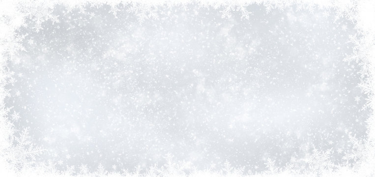 Decorative Christmas background with bokeh lights and snowflakes.