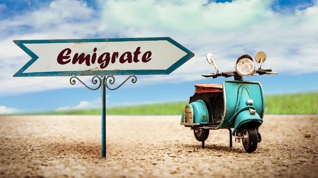 Street Sign the Direction Way to Emigrate