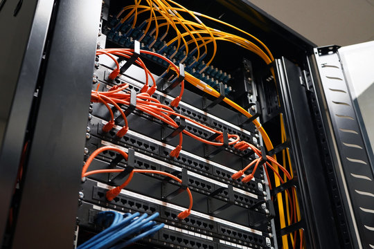 Network cabinet with fibre and network cables