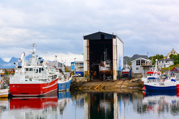 Shipyard and large ship in Ballstad, Lofoten, Norway