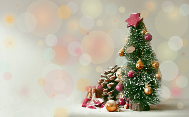 christmas fir with little angels and sparkling snowy atmospere