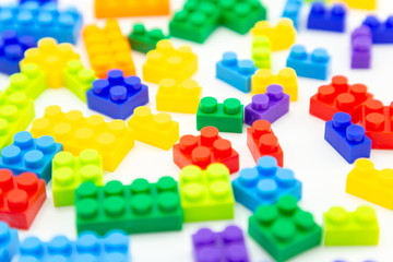 Fototapeta na wymiar plastic toy bricks . preschool children funny activity .