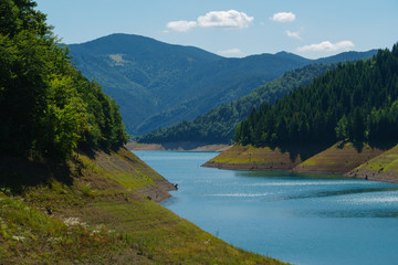 Fototapeta na wymiar Beautiful mountain lake on a sunny day