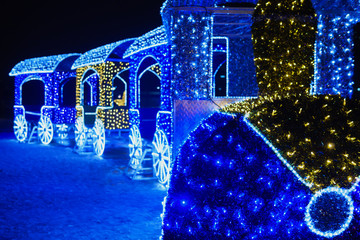 Christmas decoration with lights in the shape of the train