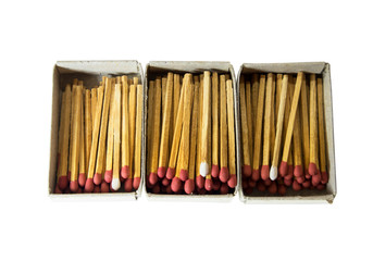 Matchboxes and matches on a white background