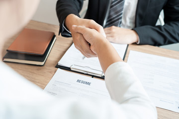 Job applicant business, career and placement businessperson shaking hand with candidate after successful negotiations or interview at the working place.