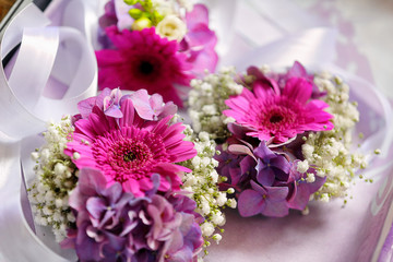Flowers to boutonniere with beauty colored gerbera. Wedding floral accessory to buttonhole.
