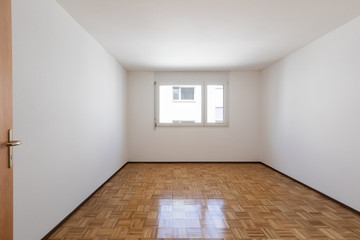 Empty room with vintage parquet