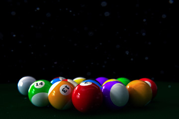 set of pool balls on green table