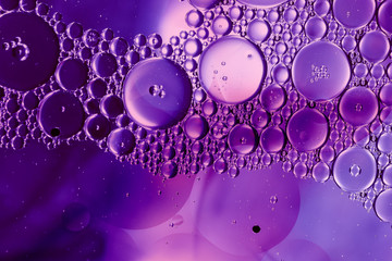 Abstract purple drop oil buttons
