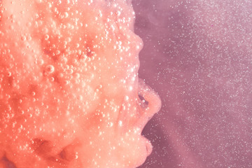 Fototapeta premium Droplets and water dots on bicolored background
