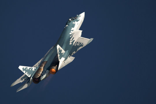 Modern jet fighter at the sky