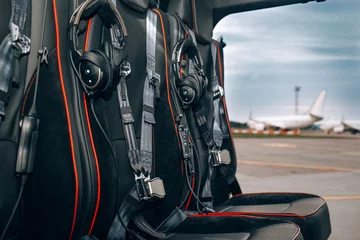 Tuinposter Helicopter passenger leather seats. Interior of luxury helicopter  © Moose