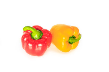red and yellow bell pepper on white background.