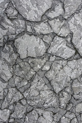 Stone floor texture. Harmonic pattern of slate tiles at the floor.