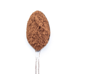 cooa powder on spoon on white background.