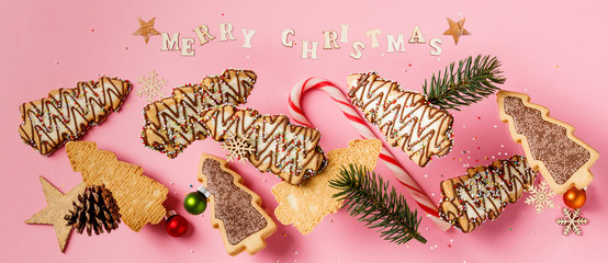 Christmas gingerbread cookies in the shape of a Christmas tree falling or flying in motion