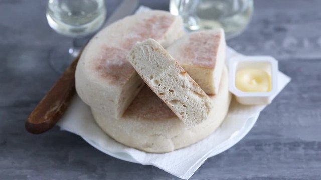 typical portuguese bread of Madeira Bolo do caco with butter