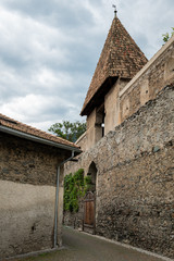 Old city wall and tower in the city of Glurns