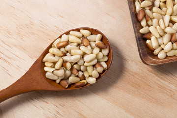 Dry Organic Pine Nuts on a Background