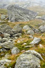 Fototapeta na wymiar Huge rocks on mountain trail