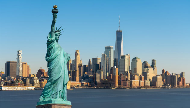 The Statue of Liberty over Scene of New York cityscape river side which location is lower manhattan which can see One world trade conter, United state of America, USA, Taking from New Jersey skyline