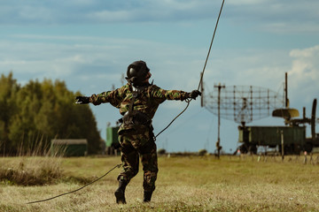 Special Forces descends the rope at a military airfield