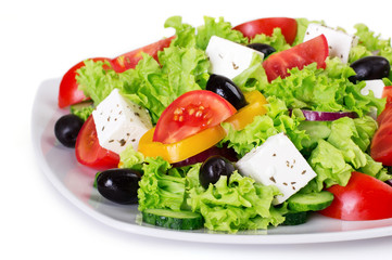 Fresh vegetable salad on white background