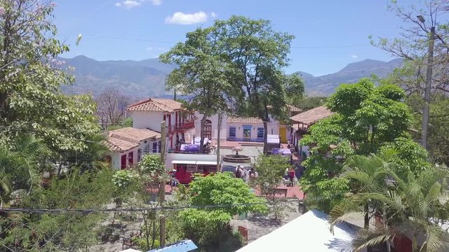 Fast revealing panorama 4k shot of Pueblo Paisa, Cerro Nutibara, Medellin