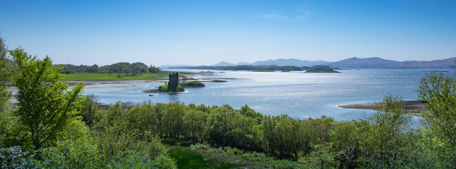 View of Loch Linhe, Scotland with Castle Stalker in summer