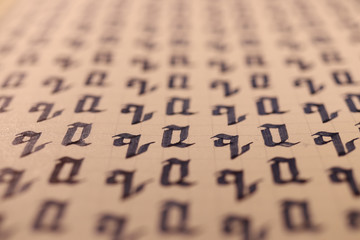 Lettering practice writing worksheet. Handwriting symbol filling pattern. Calligraphic letter Q...