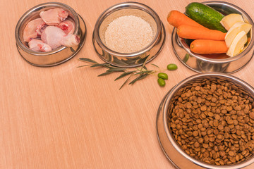 Fototapeta na wymiar Dog food prepared in feeders