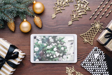 Beautiful celebratory Christmas background. New Year's holidays. Christmas holidays. Beautiful Christmas decorations on the wooden background. Loft style. Mockup