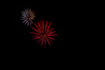 Colorful fireworks in night sky background