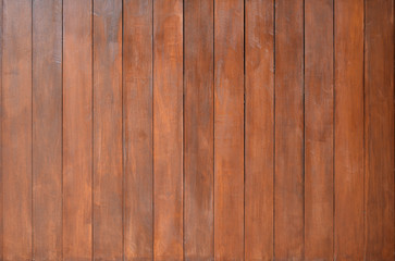 Wood plank texture background Dyed in red-brown