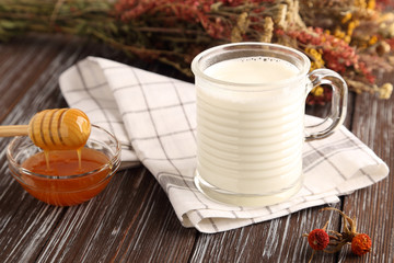 Hot milk with honey, cough medicine.