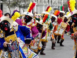 LIMA, PERÚ - AUGUST, 30, 2019: Traditional costumes in the streets of Lima during the celebration...