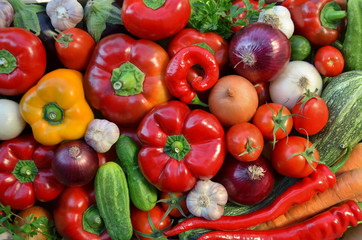 Various fresh vegetables as a background, top view. The concept of healthy food.
