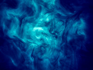 Poster color in water. Abstract background., Color paint drops in water. Ink swirling underwater, Cloud of silky ink collision, abstract smoke explosion animation, pollution concept