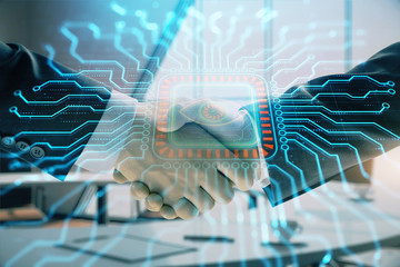 Multi exposure of tech theme hologram on office background with two men handshake. Concept of technology