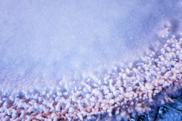 Close-up shot of boiling rock salt.