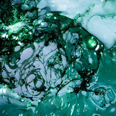 Abstract layers of green and blue slime
