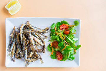 Fried sardines (fish) pescaito frito typical spanish tapa