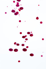 White background with abstract red drops